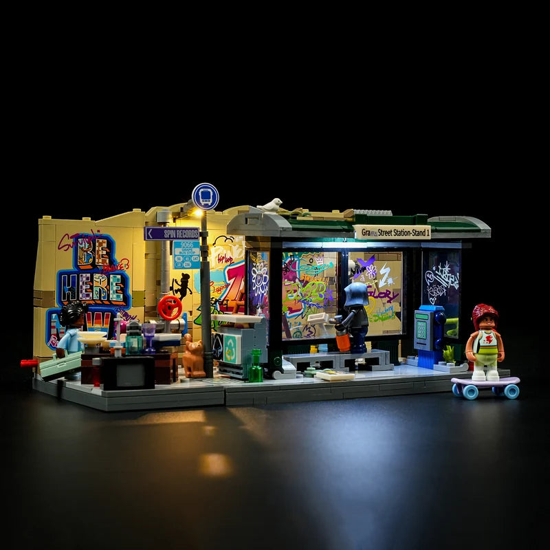 19004 Graffiti Bus Stop 4 minifigures graffiti artist skateboard girl paint-splattered worker and bus passenger