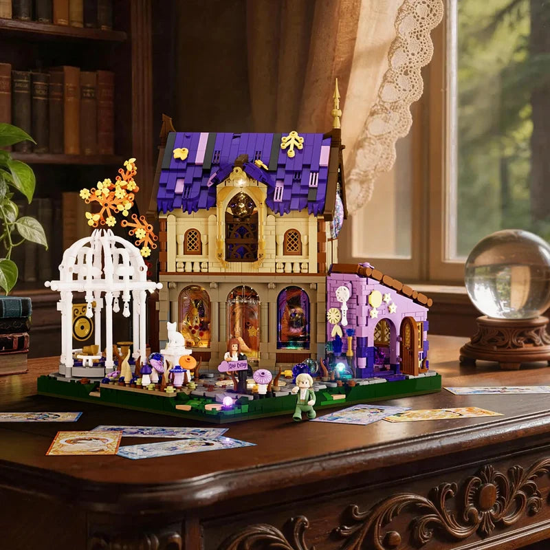 Luna Cottage LUMIBRICKS displayed on a desk – Fantasy LED building set with minifigures for adult collectors